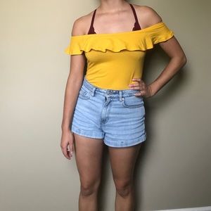 Yellow off-the-shoulder ruffle bodysuit